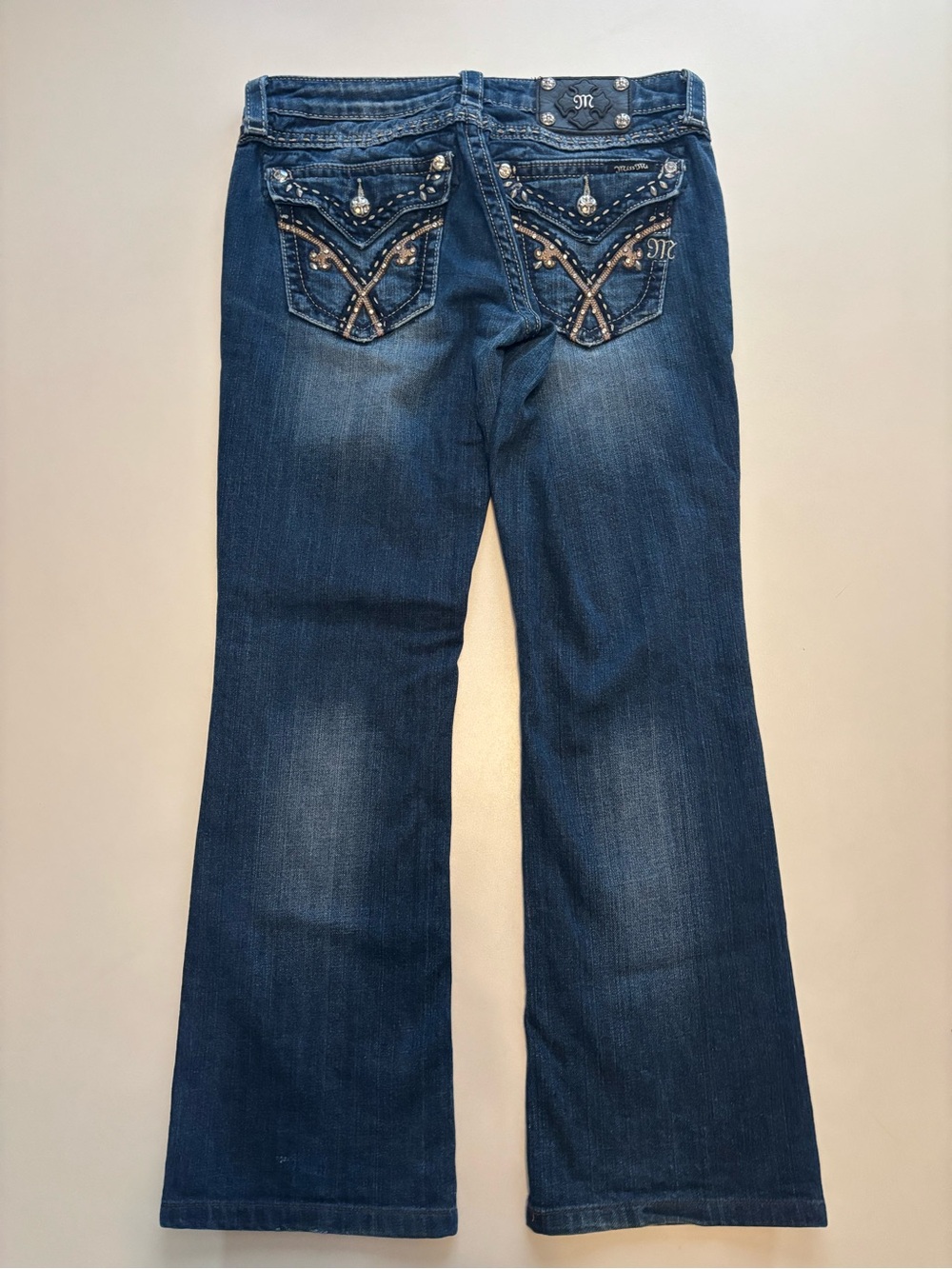 2000s Women’s miss me embroidered boot cut faded jeans with rhinestones